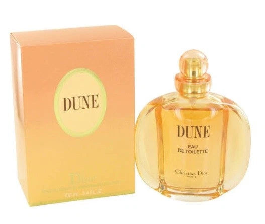 Dune perfume bottle and packaging on a white background