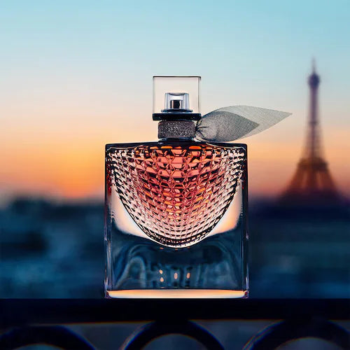 Perfume bottle with Eiffel Tower in the background