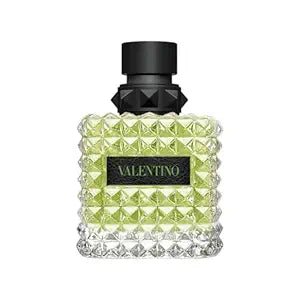 Valentino perfume bottle with green diamond-patterned design on a white background