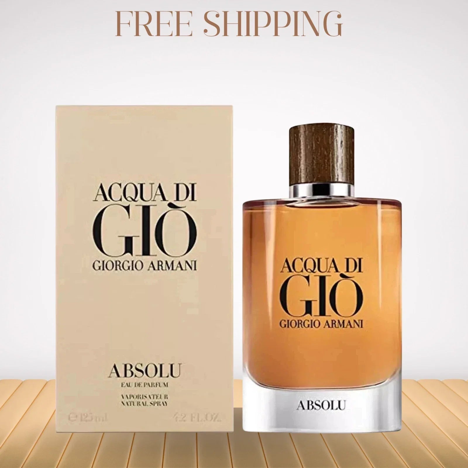 Acqua di Giò Absolu perfume bottle and packaging on a wooden surface with 'Free Shipping' text.